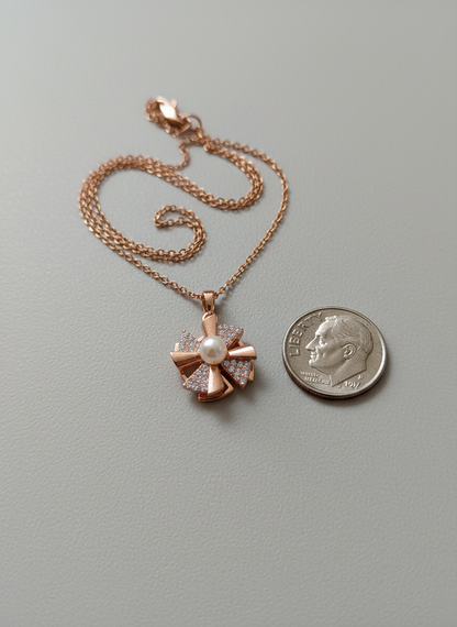 Elegant Rose Gold Pearl Spinner Pendant Necklace
