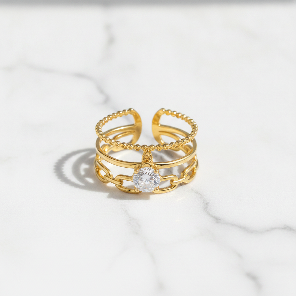 Luxury Triple Band Gold Ring with Brilliant Solitaire Stone