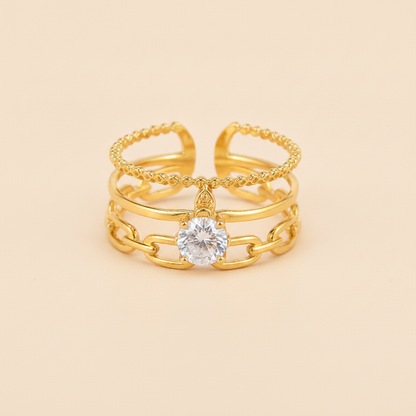 Luxury Triple Band Gold Ring with Brilliant Solitaire Stone