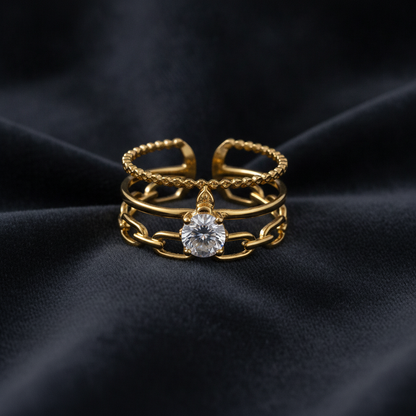 Luxury Triple Band Gold Ring with Brilliant Solitaire Stone